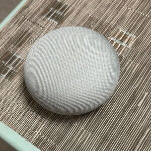 Google Home Mini Smart Speaker with Orange and White Design